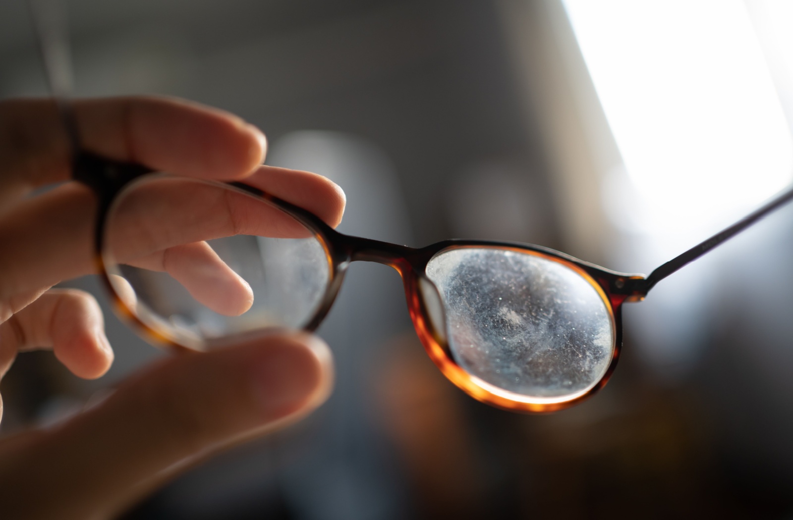 A pair of glasses that have scratches on them which can be mended with a few do-it-yourself repairs.